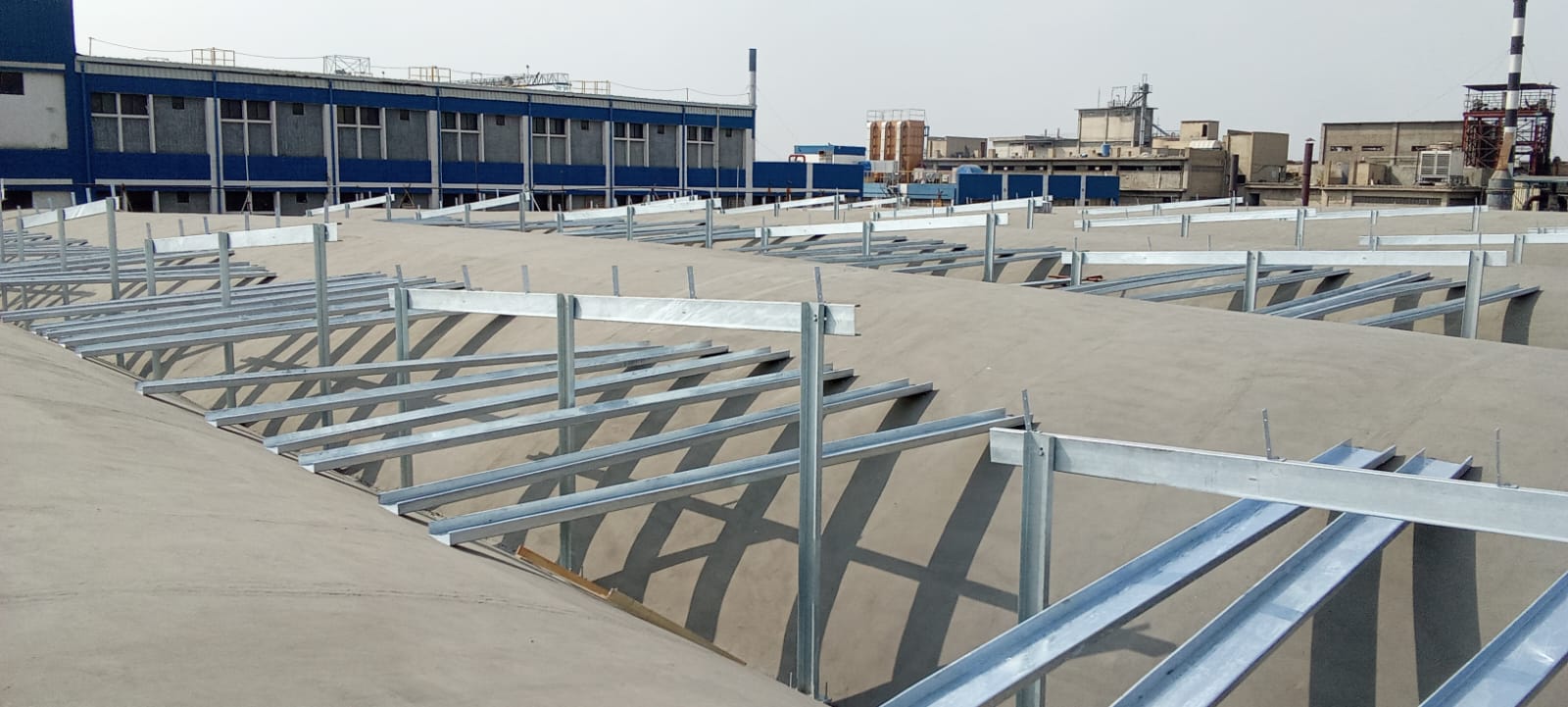 Solar mounting structure on shell roof at National Foods