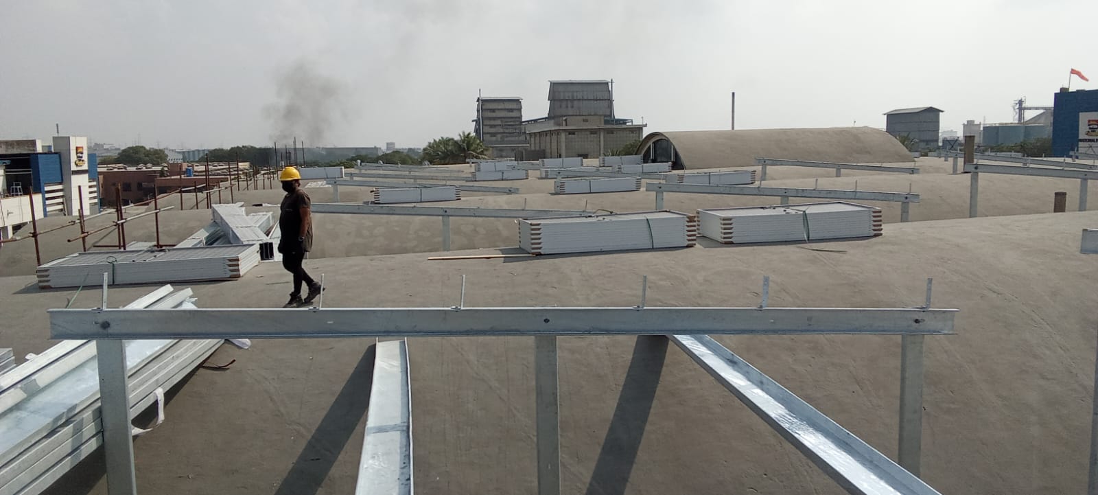 Rooftop Structure Progress — Structure installation progressing across the shell roof