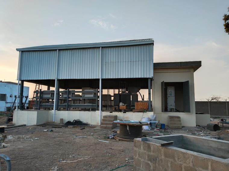 Transformer & Switchgear Yard — Transformer set in place with adjoining HT panel room