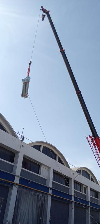 Crane Hoisting — Bundled galvanised sections hoisted under an approved lifting plan