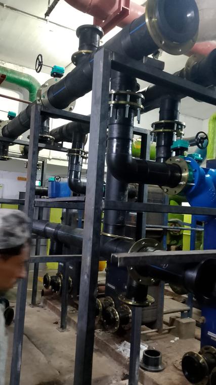 HDPE Distribution Network — Pump-room piping with valves, supports and heat exchangers