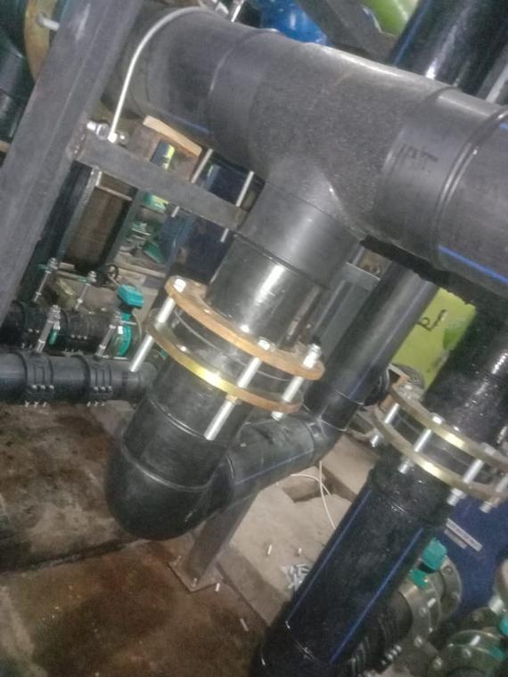 HDPE Fabrication — Butt-fused tee with backing flanges and stub ends